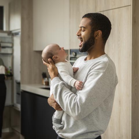 Dad with newborn baby